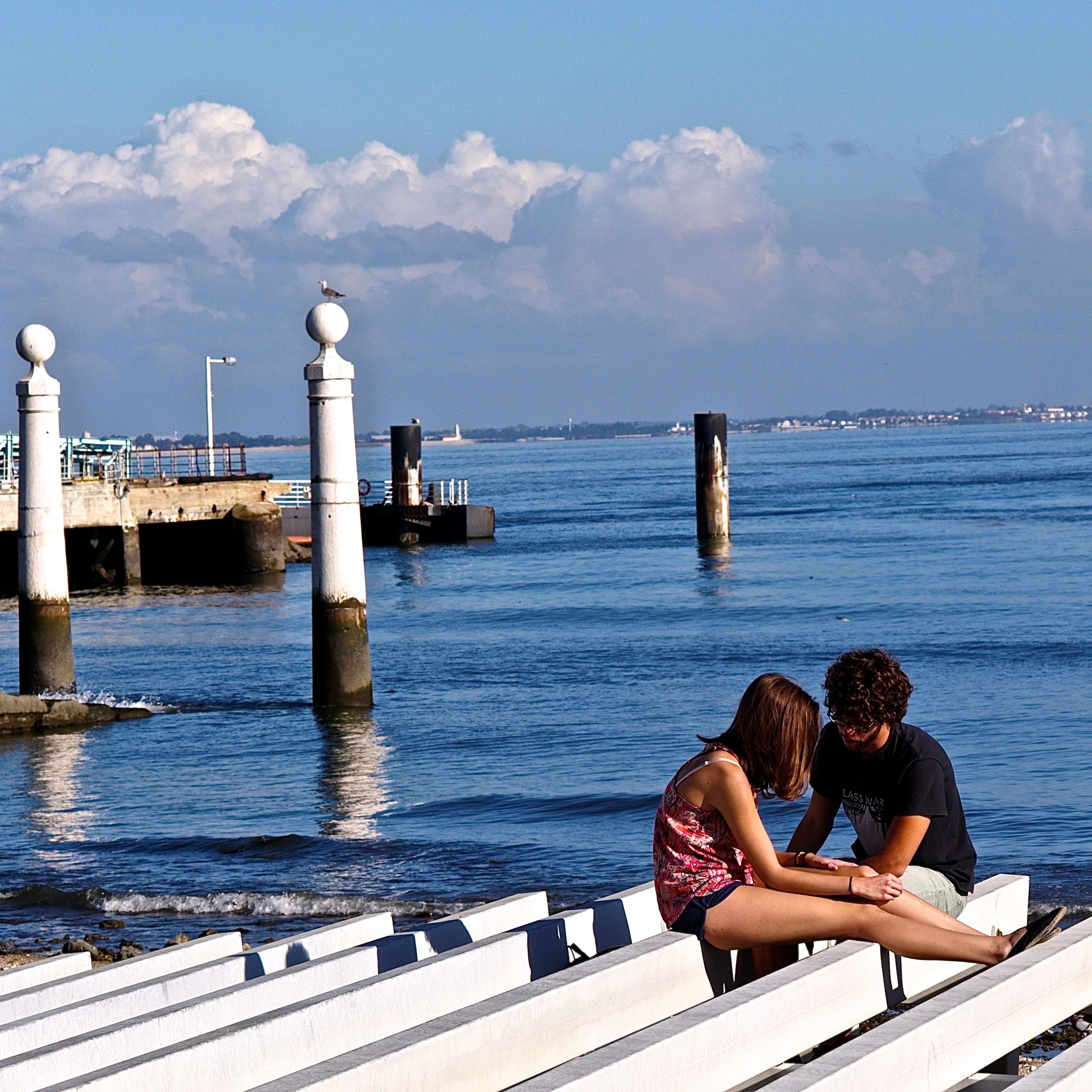 Two people in conversation outdoors
