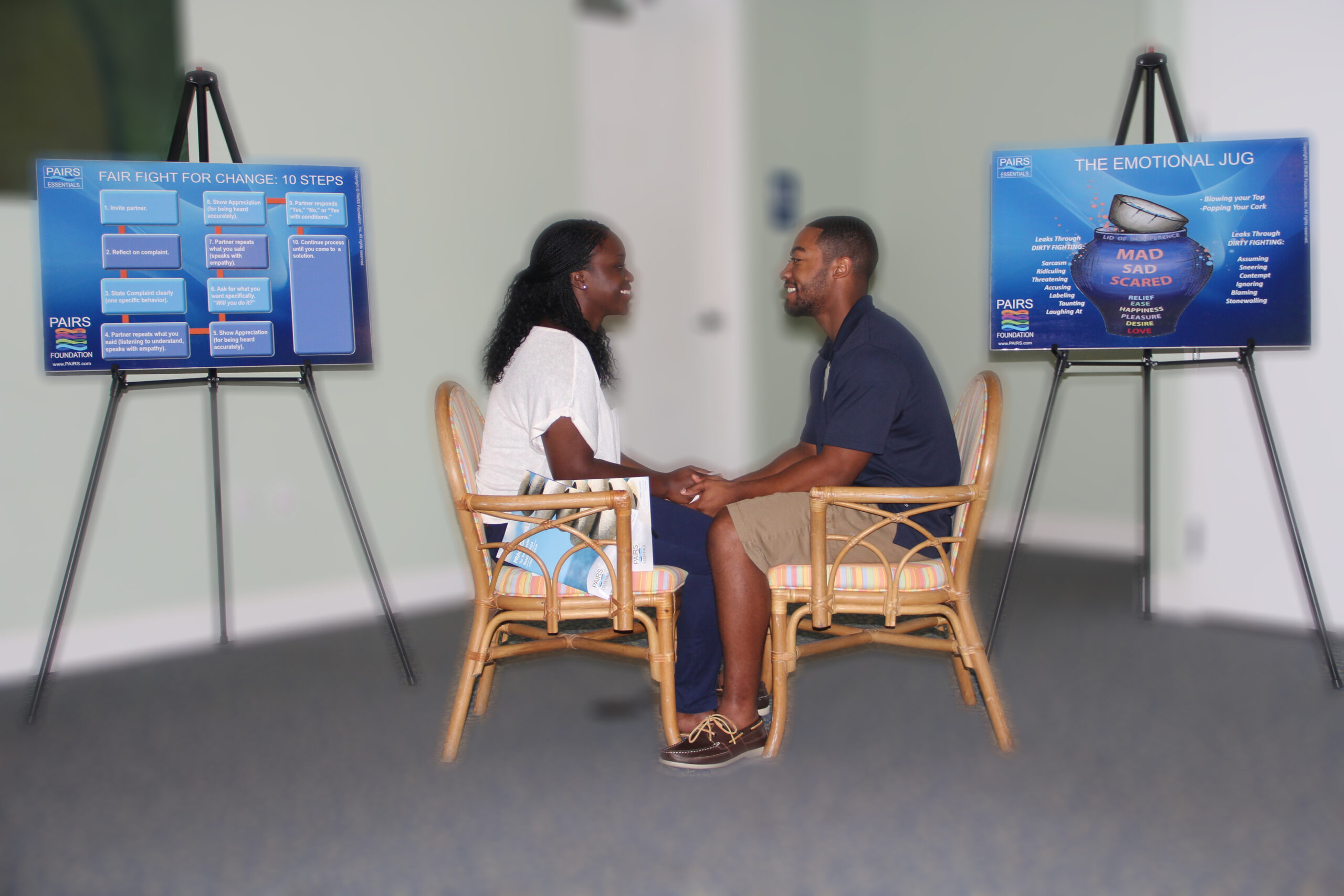 Couple practicing communication skills in a relationship class